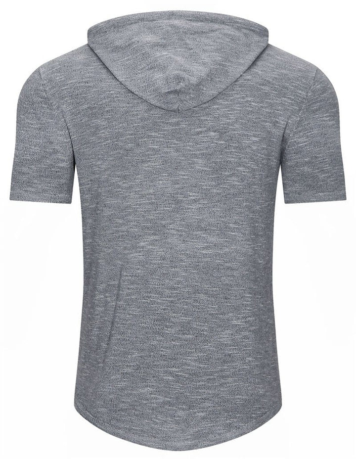 Man lifting weights in a grey men's short-sleeve gym hoodie, offering great flexibility & style