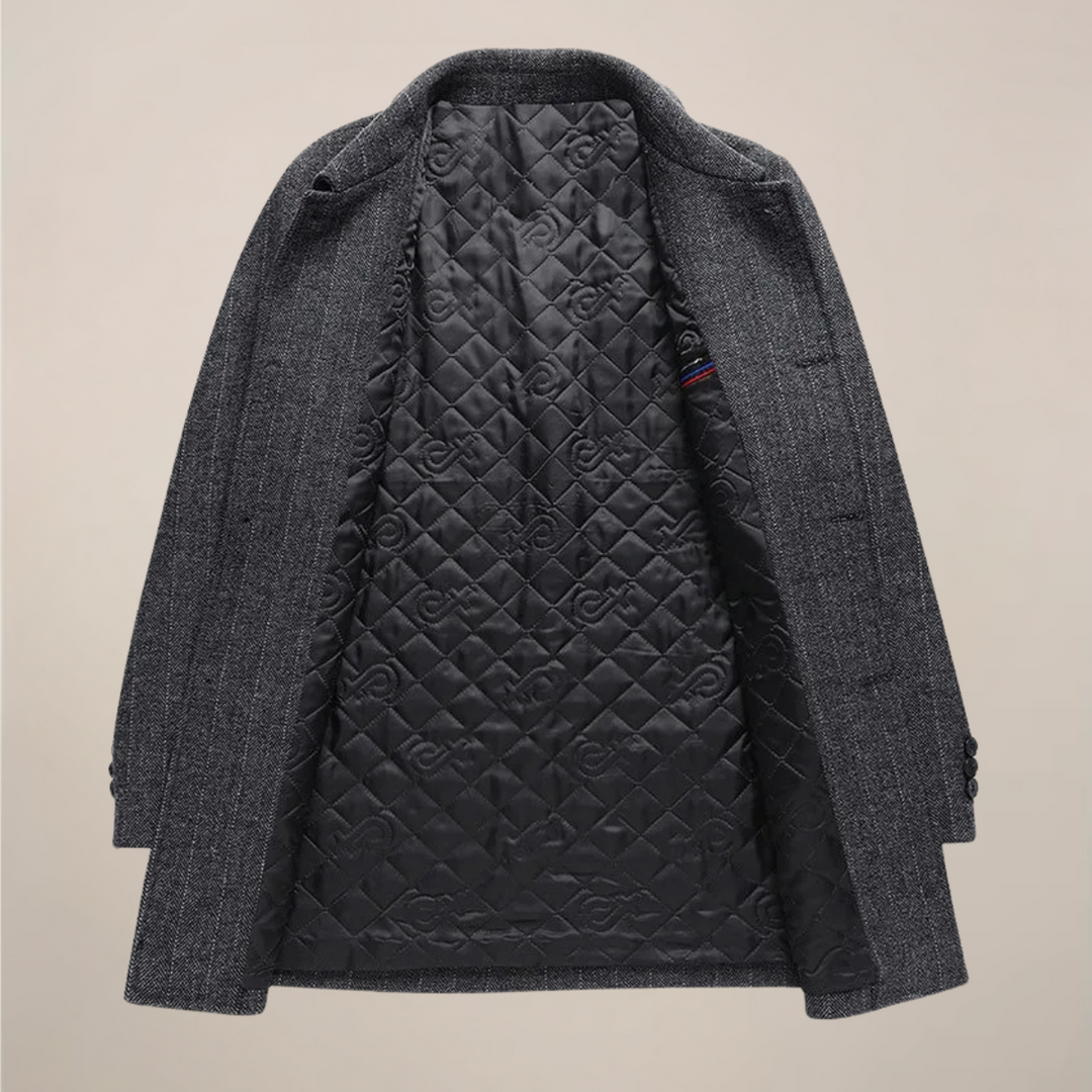 Close-up of men's herringbone car coat showcasing the elegant point collar and texture.