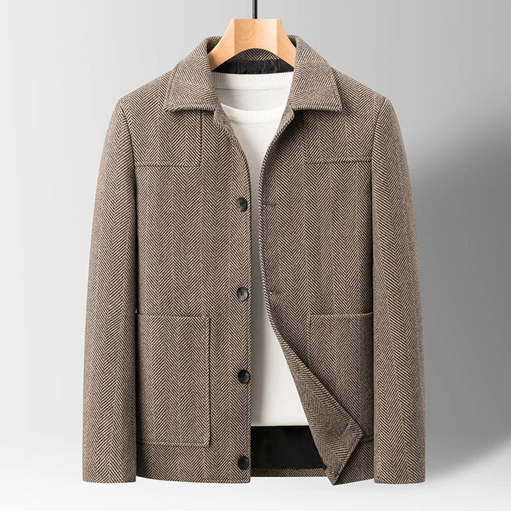 Men's herringbone tailored jacket in a timeless classic style, perfect for smart casual looks.