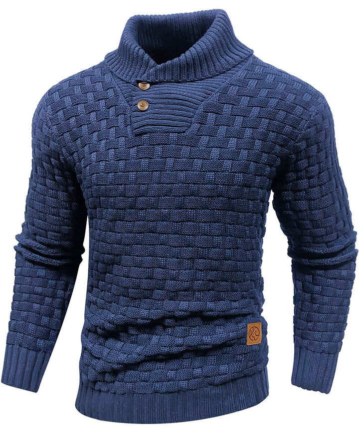 Detail shot of the buttons on a men's high collar textured sweater.
