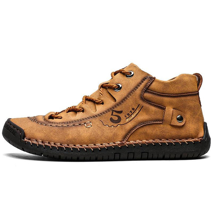 Non-slip sole on men's hand-stitched leather high-top loafers, showcasing footwear quality