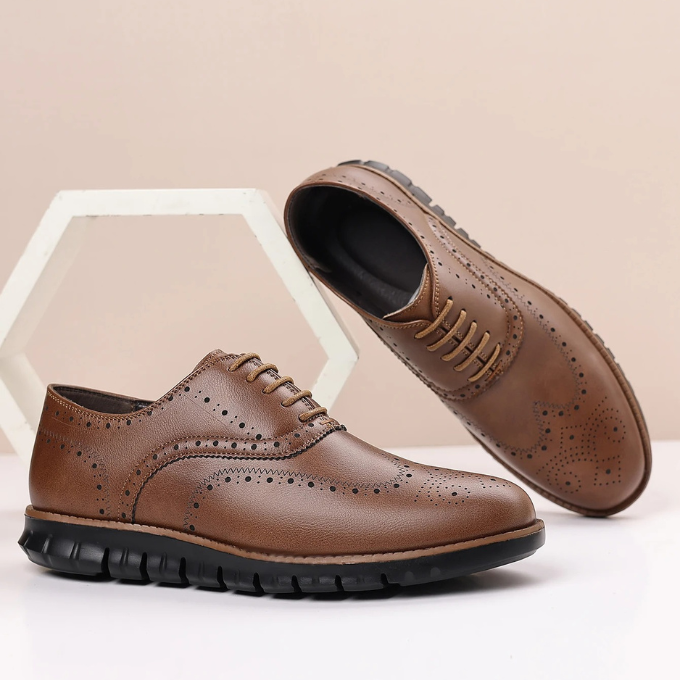 Pair of men's comfort brogue sneakers, combining the elegance of dress shoes with sneaker comfort.