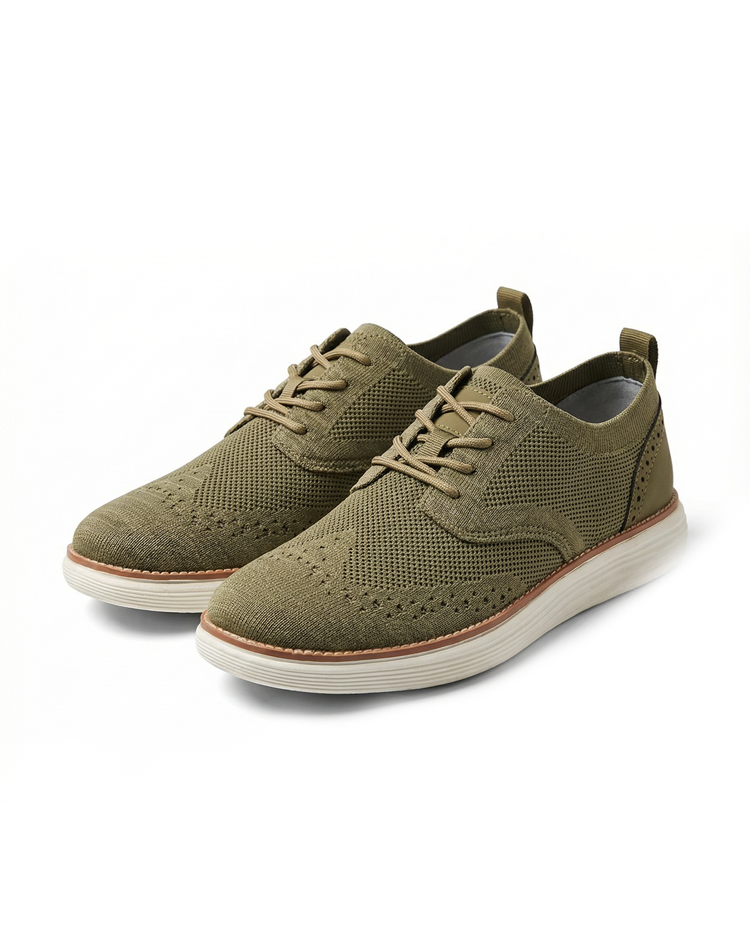 Men's hybrid dress sneakers with wingtip design and breathable knit upper, perfect for business casual.