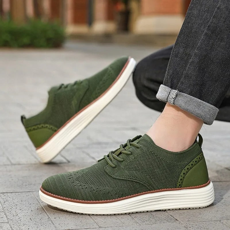 Walkable men's hybrid dress sneakers with a supportive sole and classic wingtip toe for comfort.