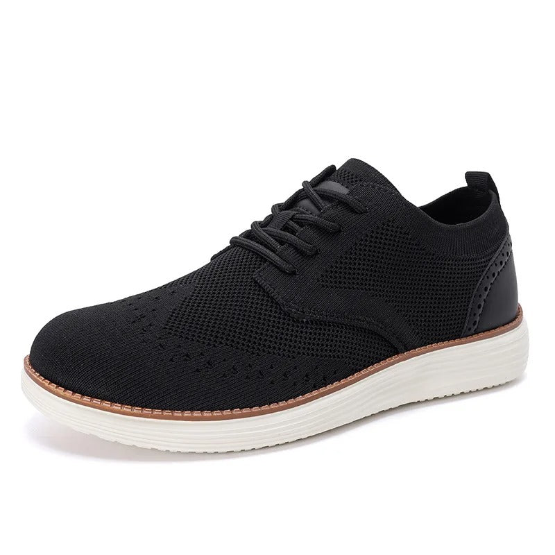 A man wearing men's hybrid dress sneakers, demonstrating their stylish fit for both casual and formal attire.