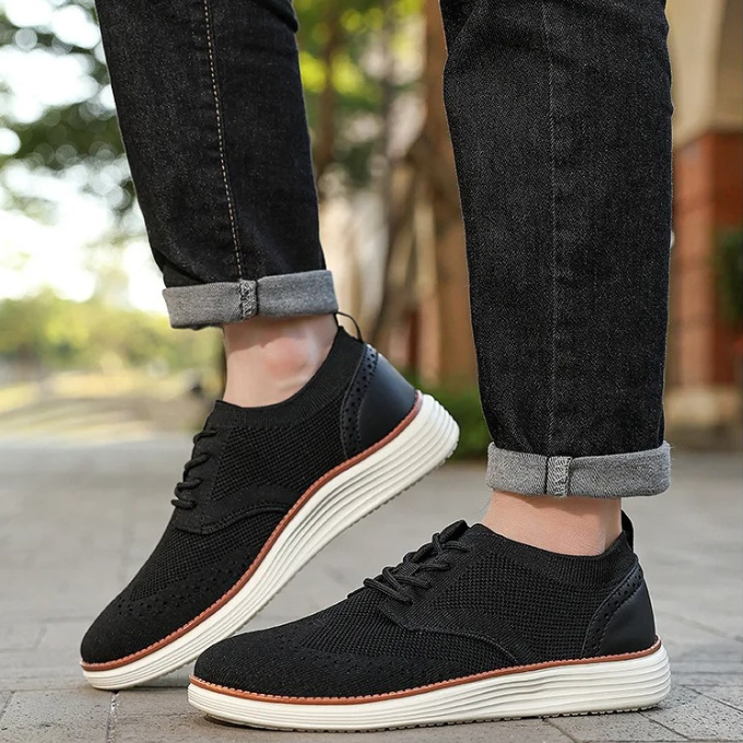 Pair of men's hybrid dress sneakers, showcasing their modern design and comfortable construction.