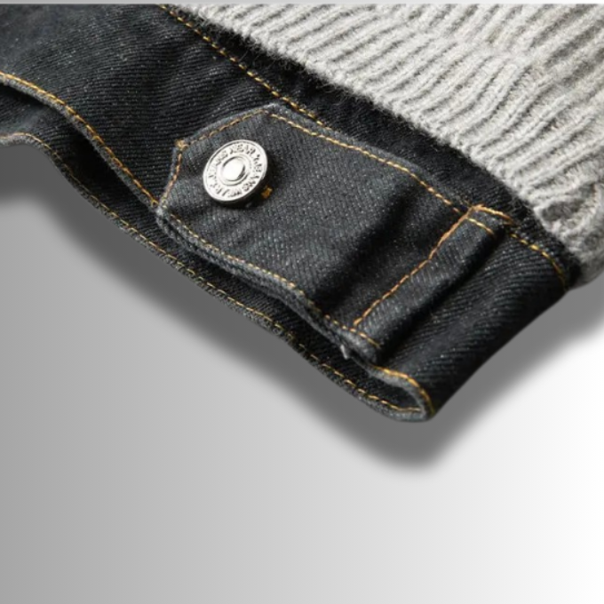 Detailed view of the denim trim on a men's knit hybrid sweater for a stylish look.