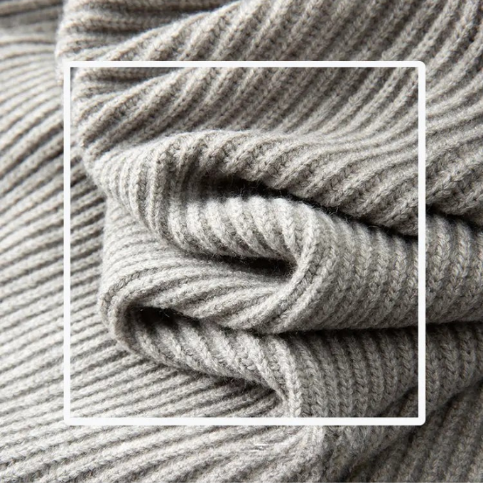 Men's apparel: a hybrid knit sweater with unique denim trim, suitable for all casual occasions.