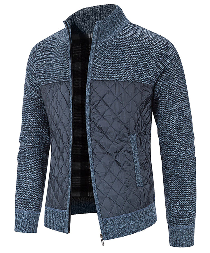 Close-up of a Men's Hybrid Quilted Sweater Jacket, highlighting the texture of the quilted front panel