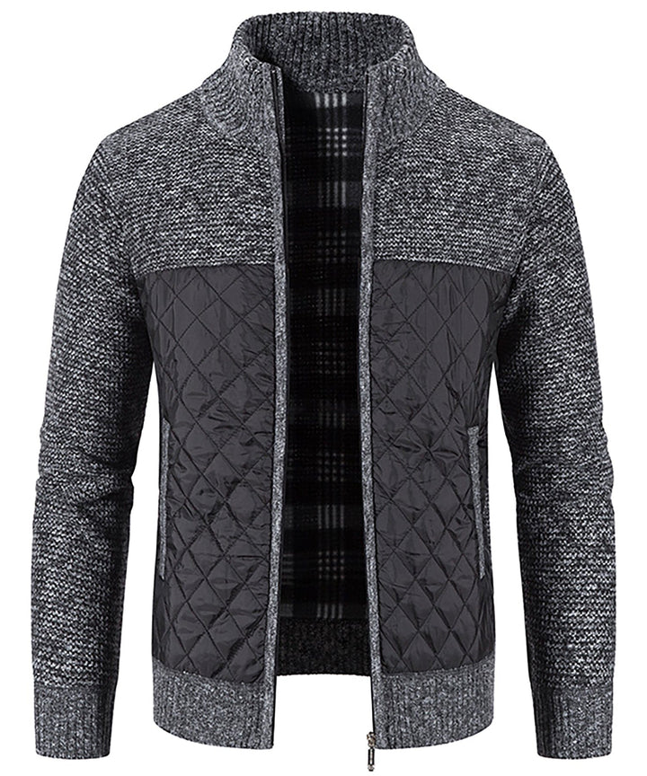 Model wearing a gray Men's Hybrid Quilted Sweater Jacket, demonstrating its casual jacket appeal