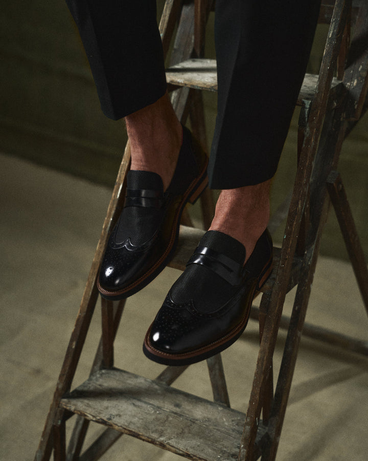 Stylish men's hybrid wingtip loafers in premium brown leather, comfortable slip-on dress shoes