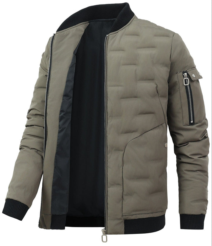 Close-up of the quilted texture on a men's insulated bomber jacket, ideal for cold weather.