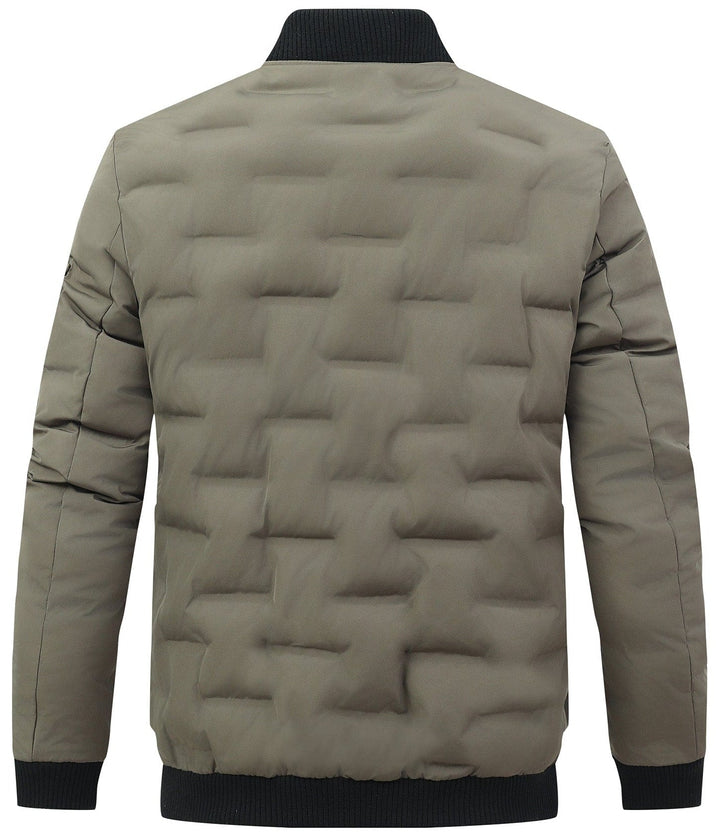 Man wearing an army green puffer bomber jacket, showcasing its modern men's fashion style.