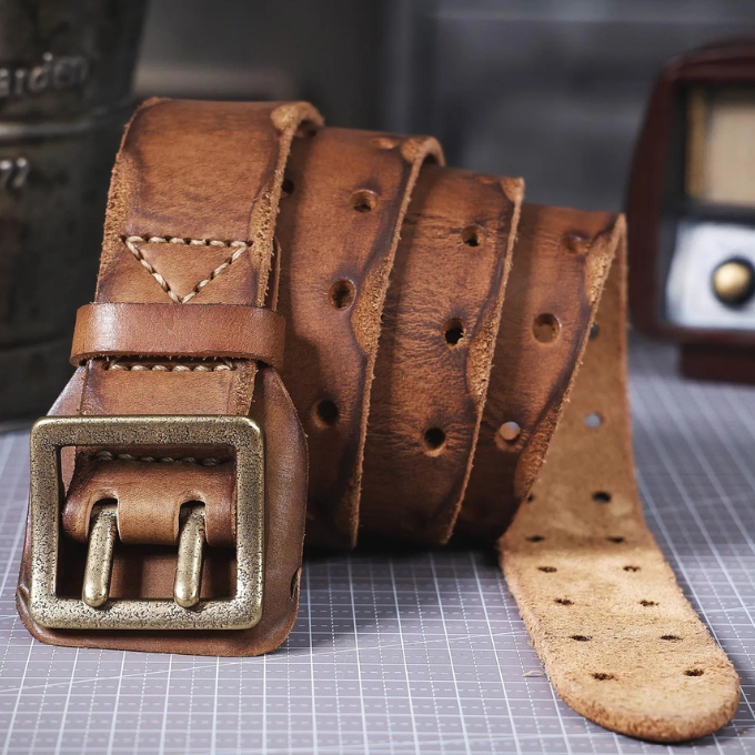 Vintage brass buckle on a men's Italian leather belt, perfect for workwear fashion.