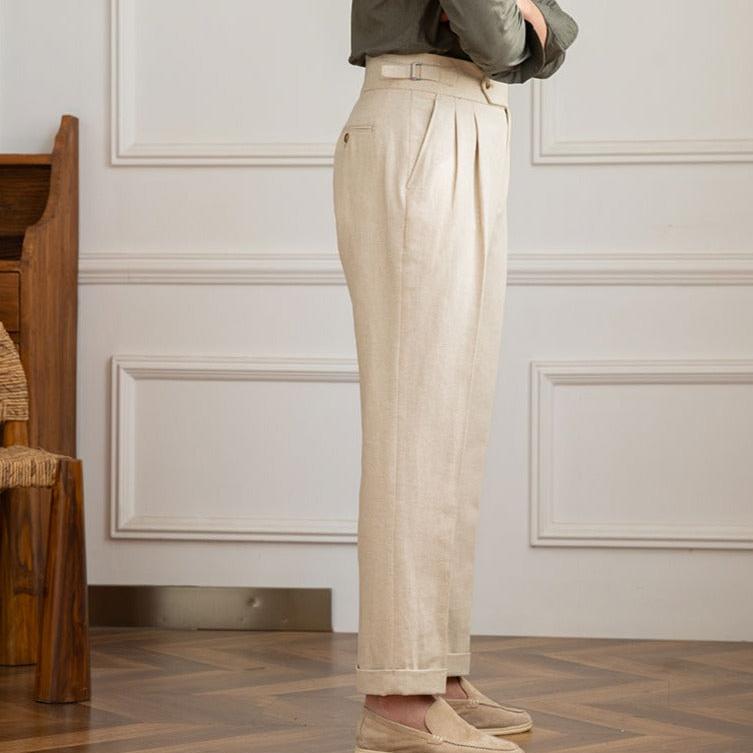 Tailored Italian style men's pleated trousers, offering a sophisticated high-waisted fit.