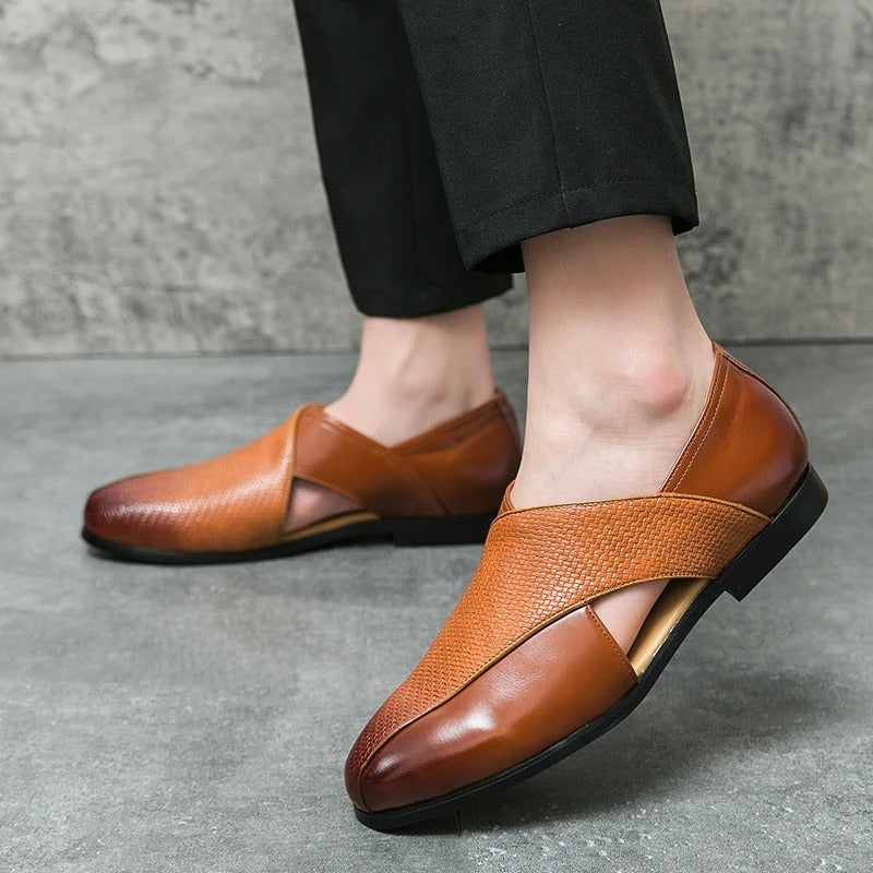 Close-up of a men's woven leather loafer, showcasing intricate texture and craftsmanship