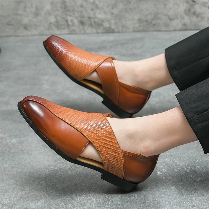 Front view of men's Italian style woven loafers, showcasing classic design and premium leather
