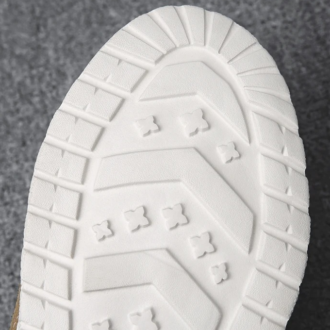 Detail of the elastic gore on men's gray canvas comfort slip-on shoes