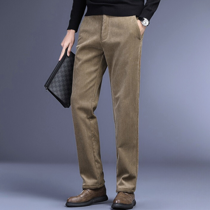 Men's navy corduroy stretch trousers, side view, offering comfort and style for any occasion.