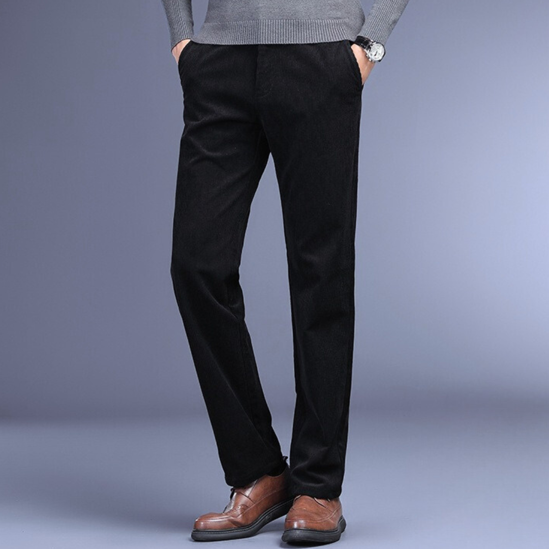 Dark brown corduroy stretch trousers for men, close-up of fabric, showcasing quality and feel.