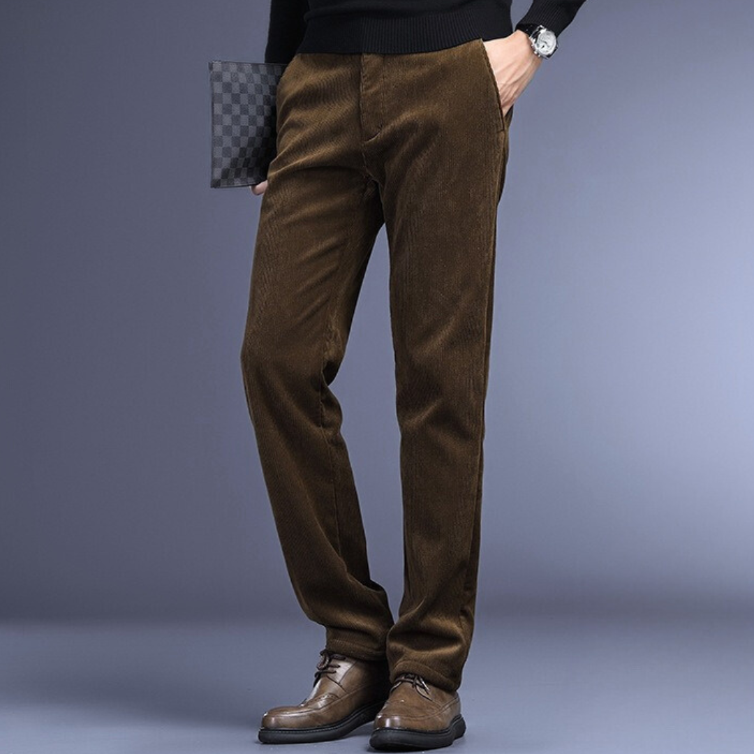 Men's soft corduroy pants in khaki, styled with a formal shirt, emphasizing versatile men's fashion.