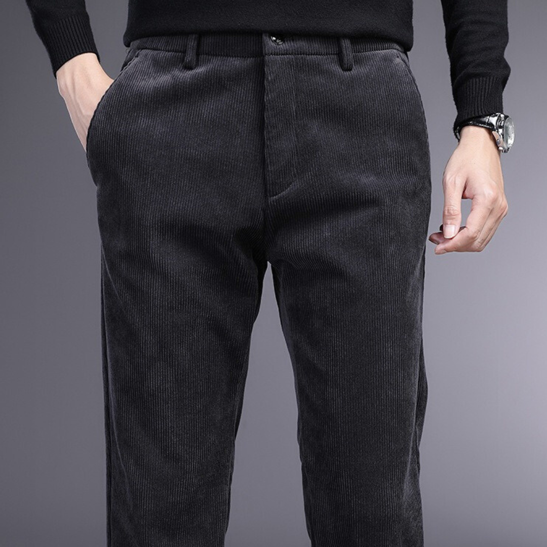 Brown men's corduroy trousers, full length, providing a comfortable yet polished look.