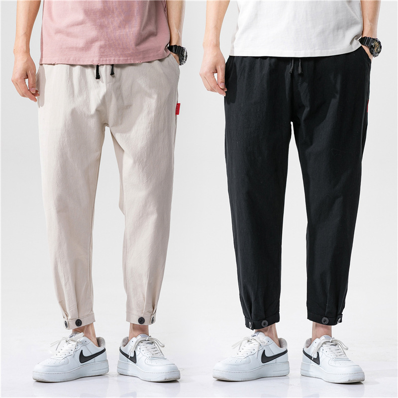 Stylish gray linen blend men's tapered cropped pants, breathable for warm weather