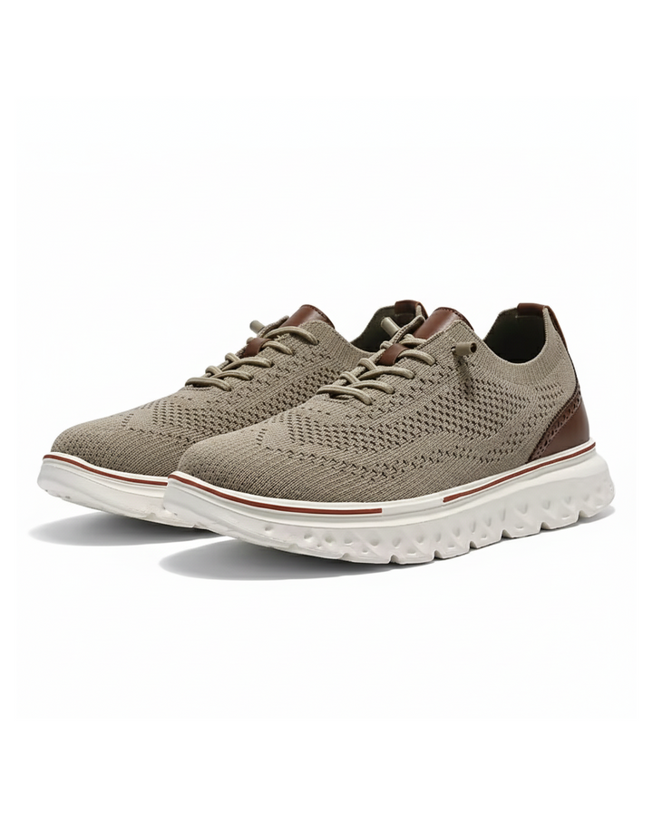 Men's knit brogue dress sneakers in a stylish grey, offering comfort and breathability.