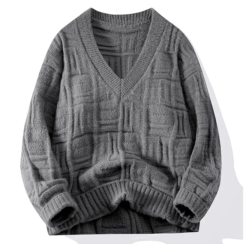 Close-up of a men's V-neck knit sweater, showing the detailed knitwear texture and long sleeve.