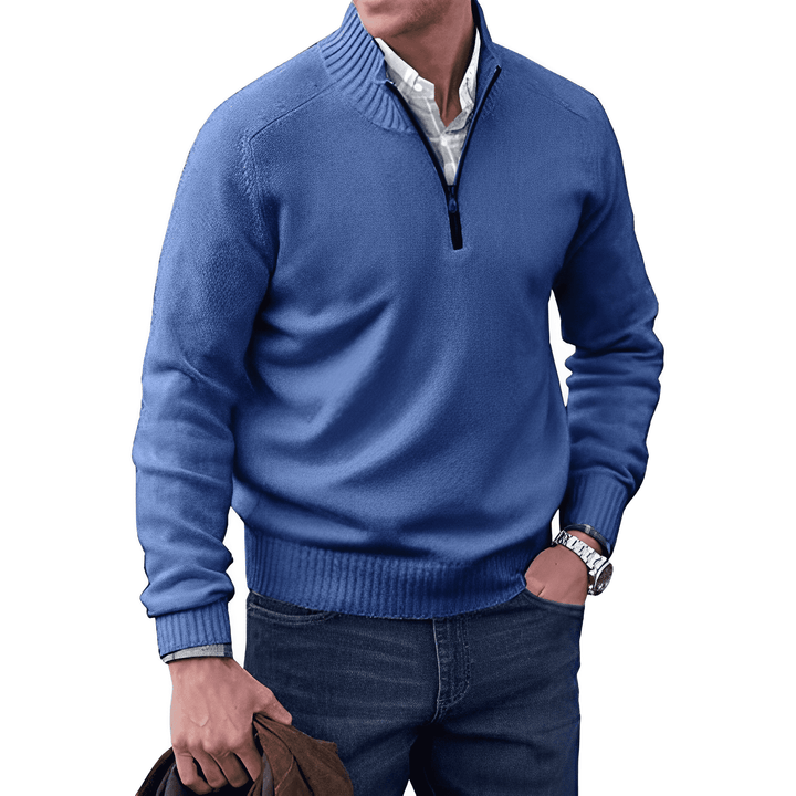 Detailed shot of the half-zip collar on a men's knitted pullover jumper, highlighting its versatility.