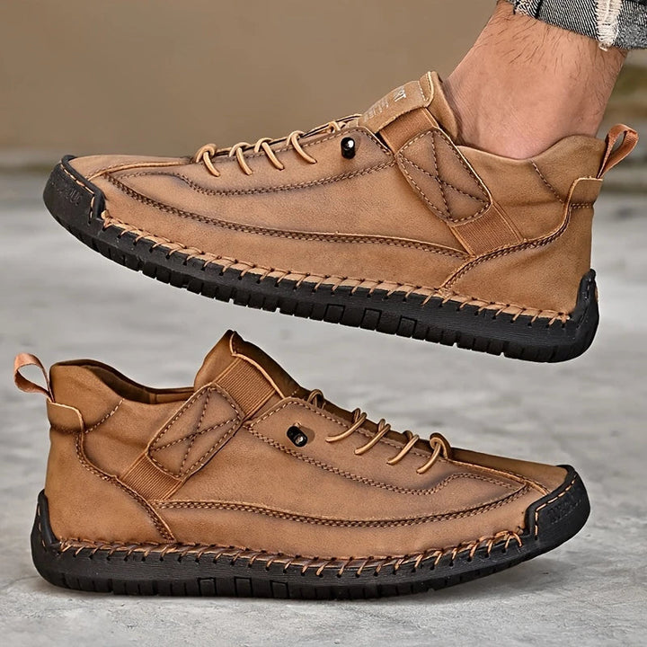 Comfort-focused men's black leather orthopedic sneakers, designed for long-lasting wear and support.