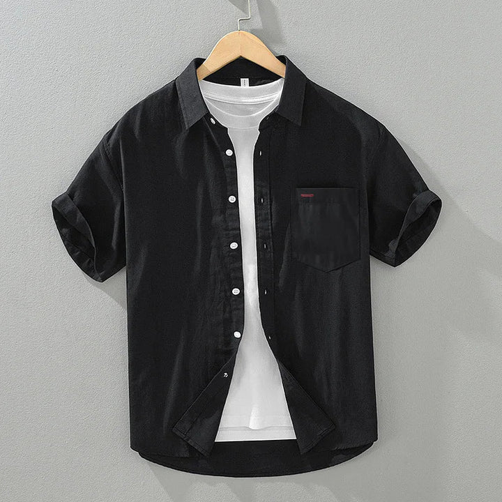 Men's lightweight cotton blend summer shirt in a relaxed fit with short sleeves and a chest pocket.