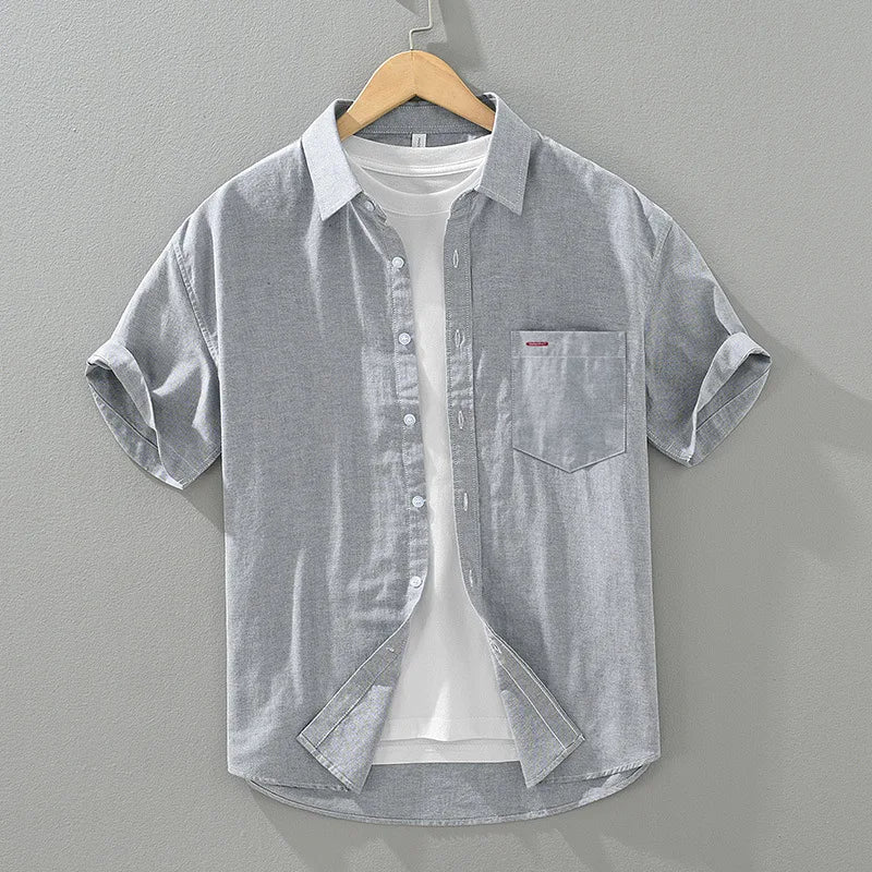 Stylish men's casual shirt, lightweight cotton blend for ultimate summer comfort, short sleeve design.