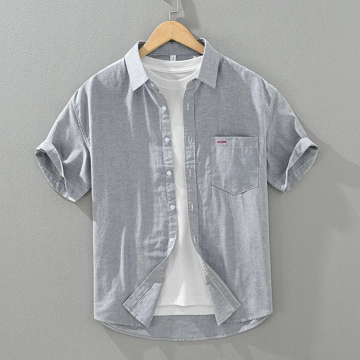 Stylish men's casual shirt, lightweight cotton blend for ultimate summer comfort, short sleeve design.