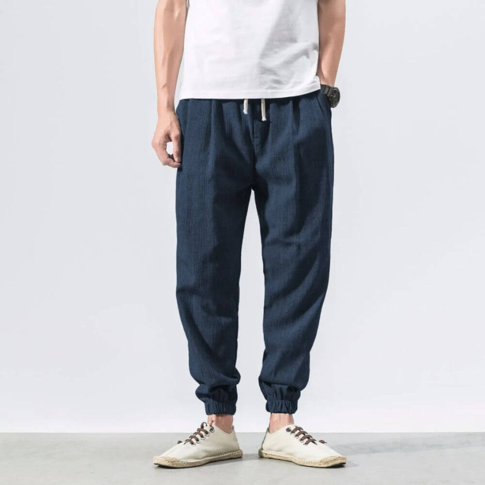 Relaxed fit men's drawstring pants, great for summer activities and comfort.