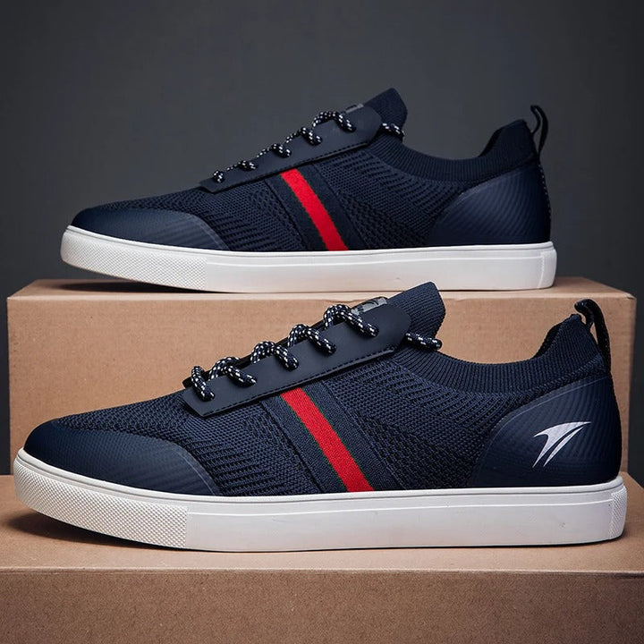 Close-up of men's gray knit athletic sneakers, breathable mesh for casual everyday wear