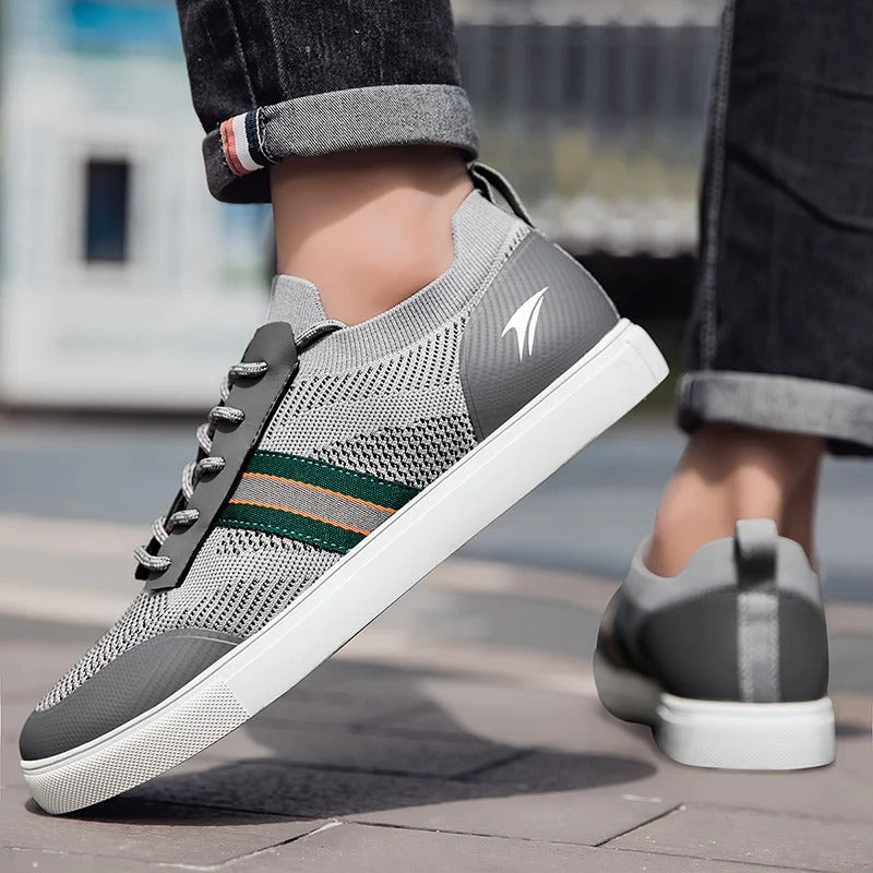 Top-down view of men's navy blue casual sneakers, knit fabric detail, perfect for daily wear