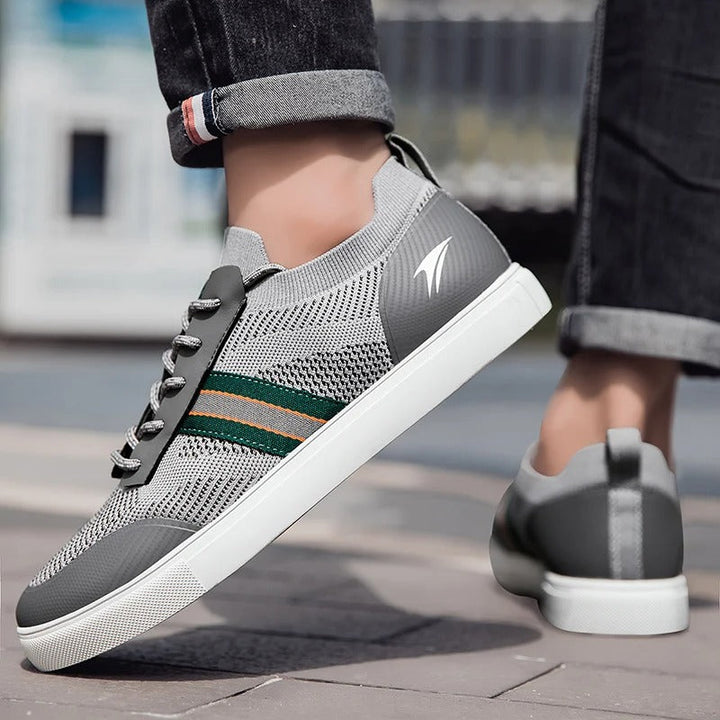 Top-down view of men's navy blue casual sneakers, knit fabric detail, perfect for daily wear