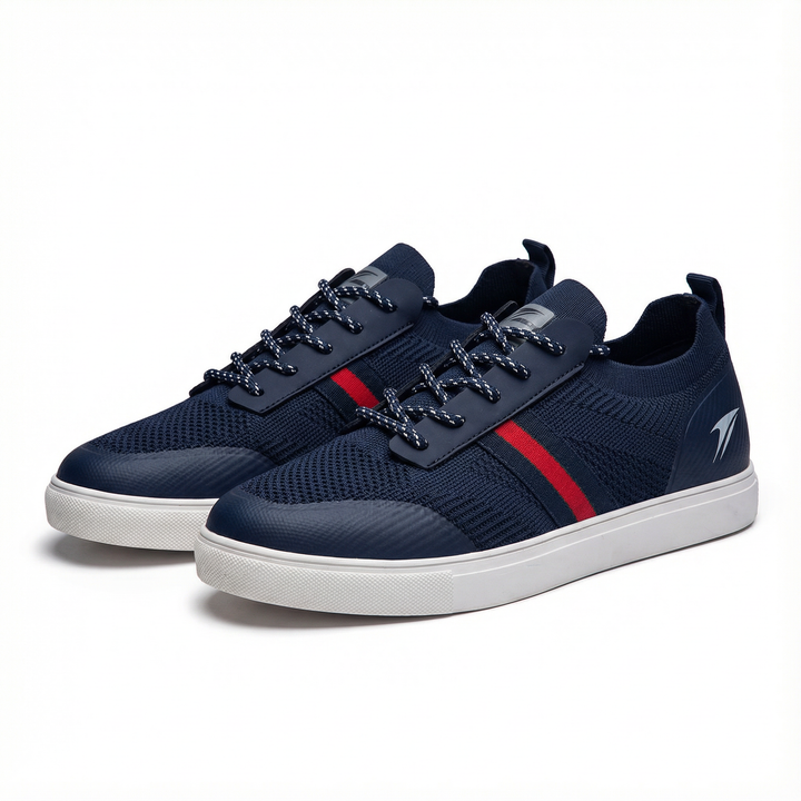 Styled shot of men's knit comfort shoes in navy, versatile for everyday and casual wear