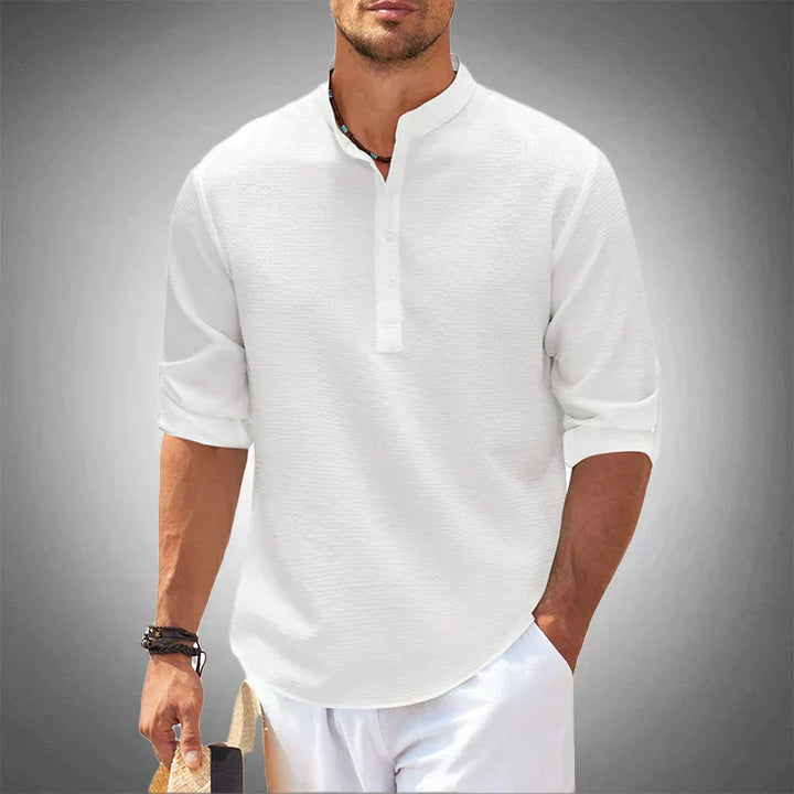 Breathable men's short sleeve summer shirt, perfect for warm weather comfort. Lightweight casual button-up style.