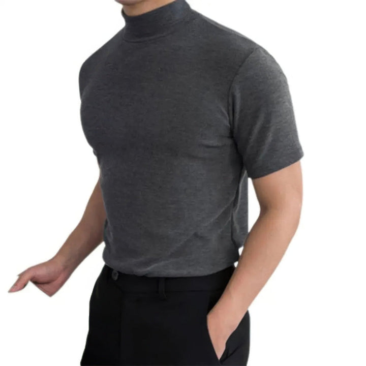 Modern men's short-sleeve turtleneck shirt, a versatile lightweight basic for everyday stylish summer outfits.