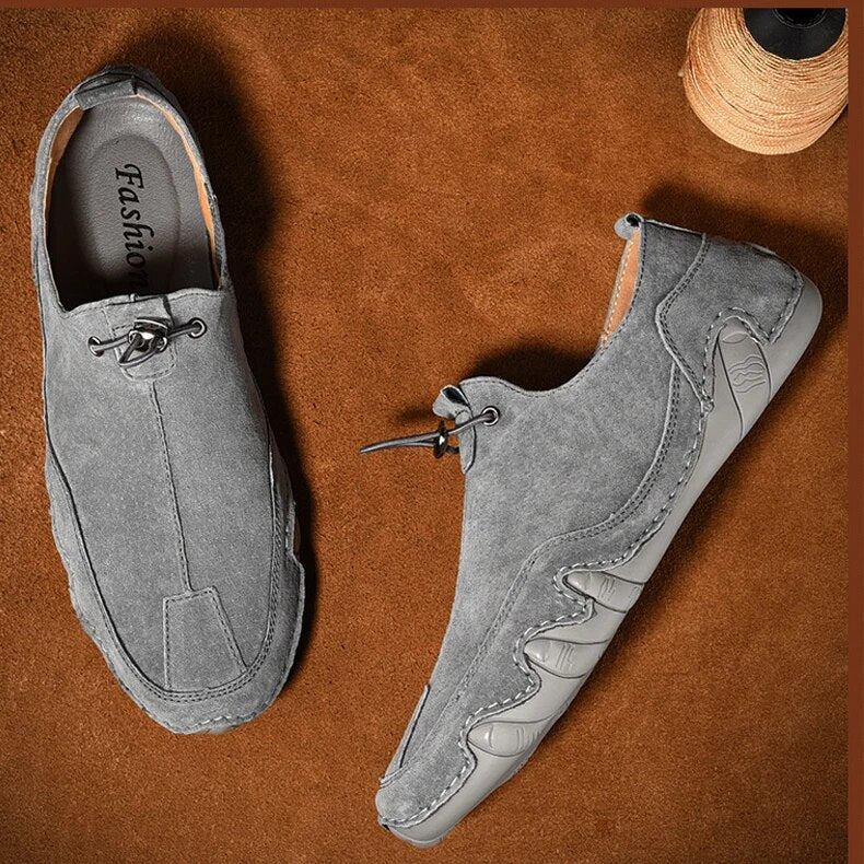 Stylish men's casual loafers, slip-on design with adjustable fit. Ideal for comfortable, everyday wear.