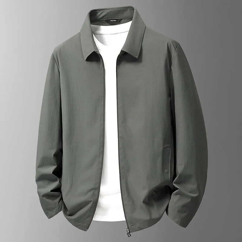 Close-up of a men's waterproof jacket fabric, highlighting its performance and durable construction.