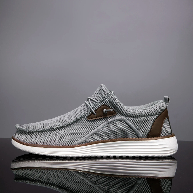 Men's casual loafers displayed with other warm-weather accessories, summer style