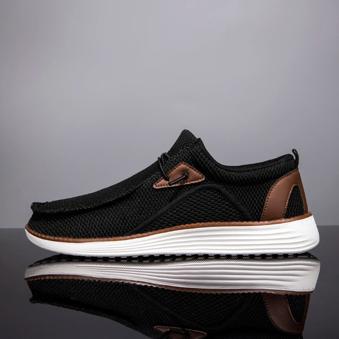 Image of men's loafers on a wooden floor, ready for comfortable, everyday wear