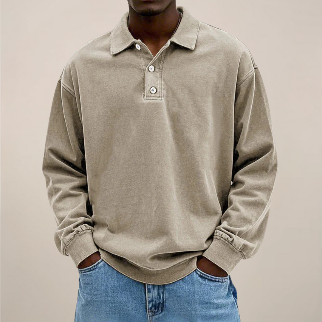Modern men's long sleeve polo shirt. Smart casual top with button placket for versatile everyday style.