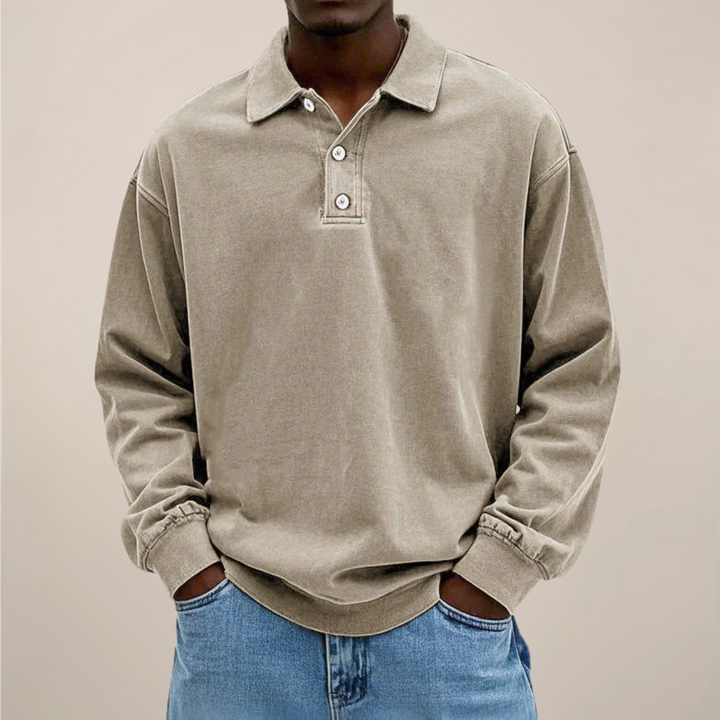 Modern men's long sleeve polo shirt. Smart casual top with button placket for versatile everyday style.