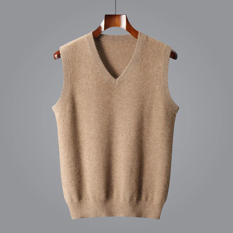Men's luxurious cashmere v-neck sweater vest in a classic navy blue, perfect for layering formal outfits.