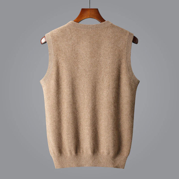 Soft grey men's v-neck cashmere sweater vest, ideal for adding warmth and style to a casual ensemble.