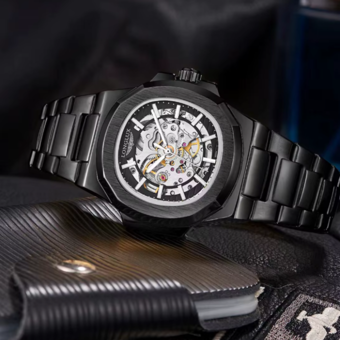Detailed shot of men's skeleton watch dial, revealing complex automatic mechanical engineering